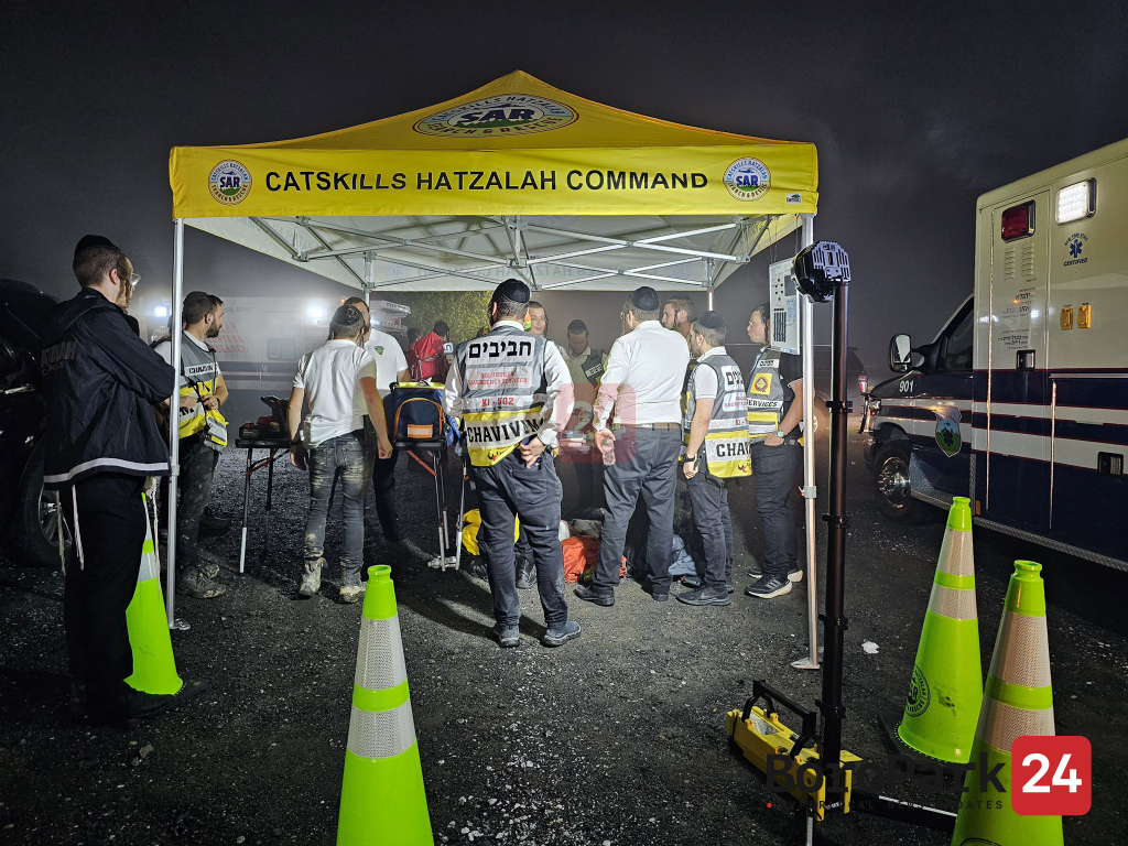 Chavivim members under the Catskills Hatzalah Command tent during the overnight operation