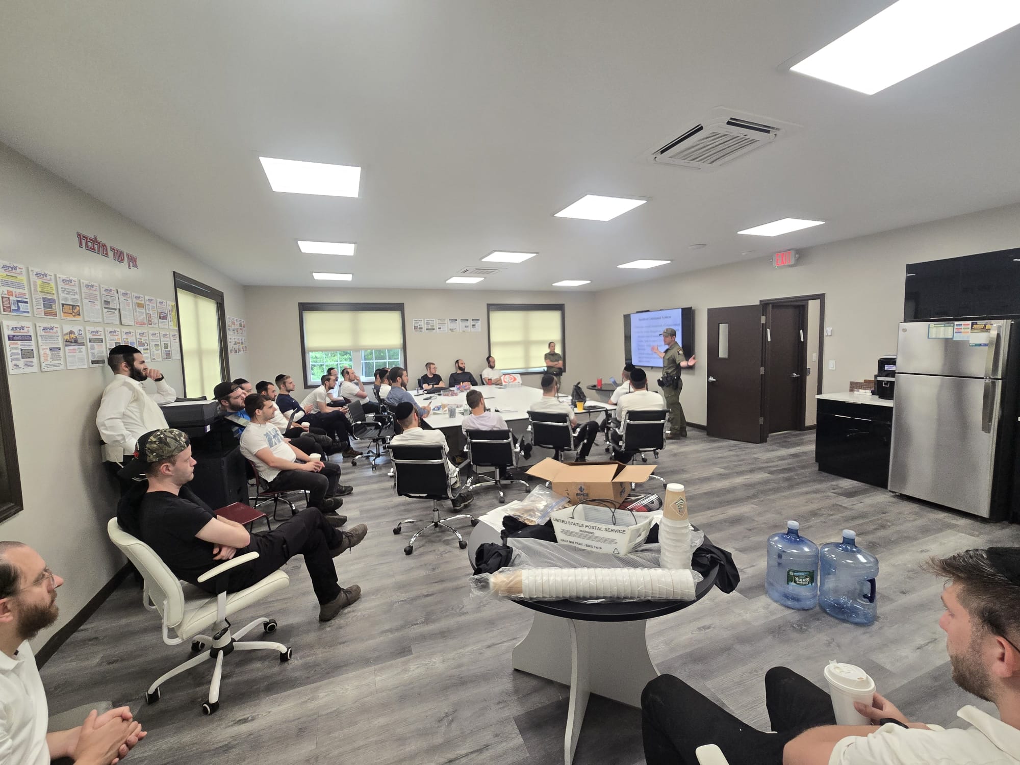 Chavivim SAR members in a classroom training session